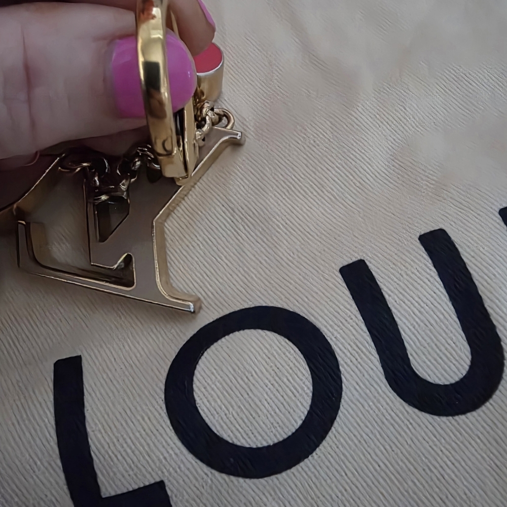 Authentic Louis Vuitton Floral Pink and Gold Key Holder a solid pink color - Picture 10 of 16